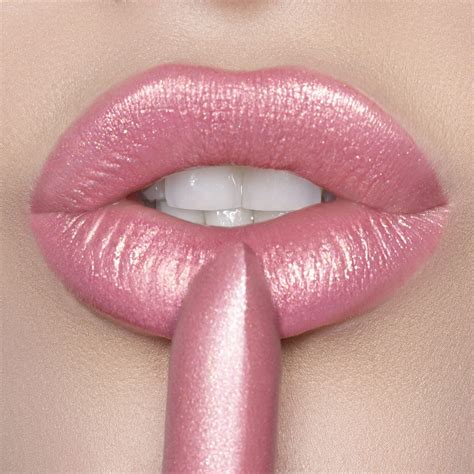 light pink shimmer lipstick.